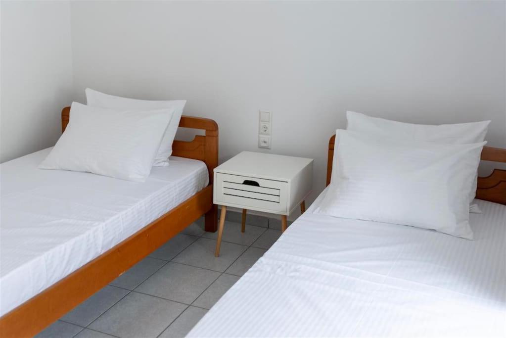 Postel nebo postele na pokoji v ubytování AZURE home
