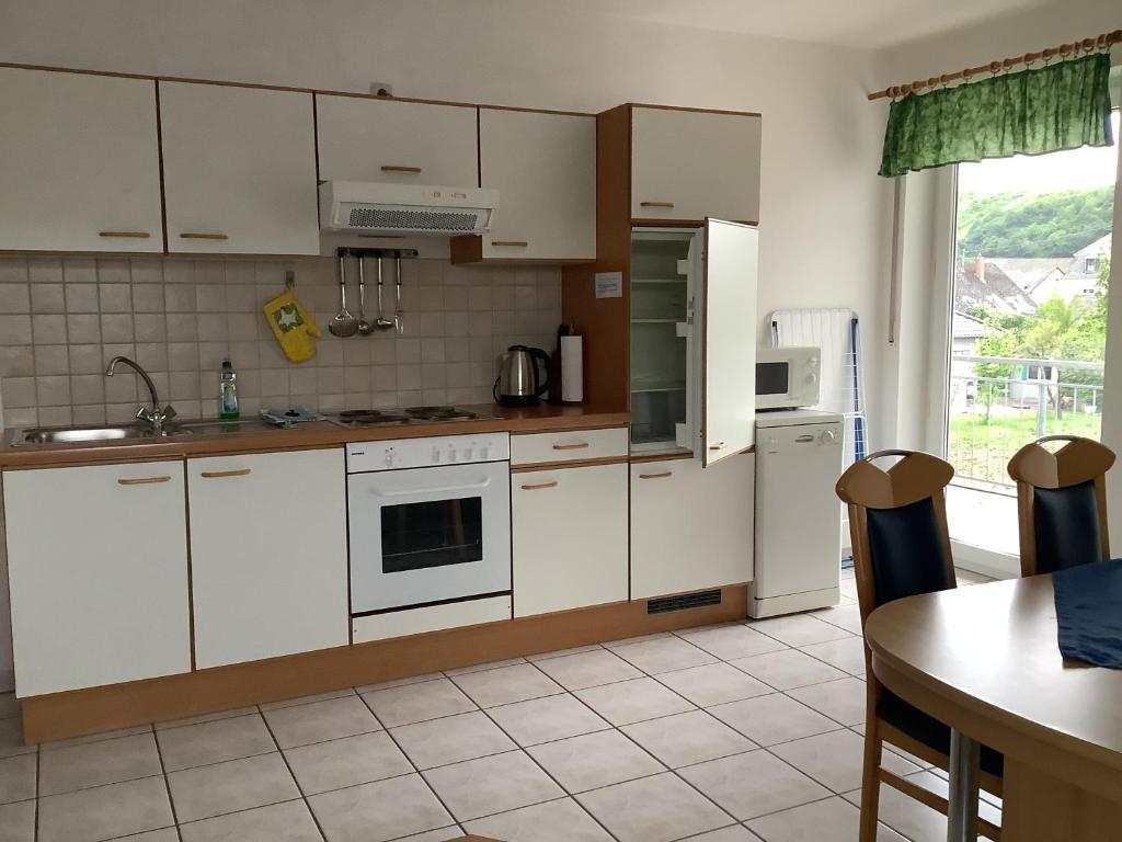 Kuchyň nebo kuchyňský kout v ubytování Mosel Ferienresidenz ZickZack