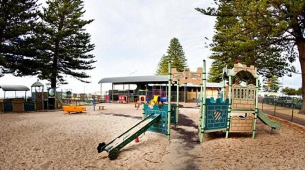 a park with a playground with a slide at The Block Escape - Ocean Views No 6 in Victor Harbor