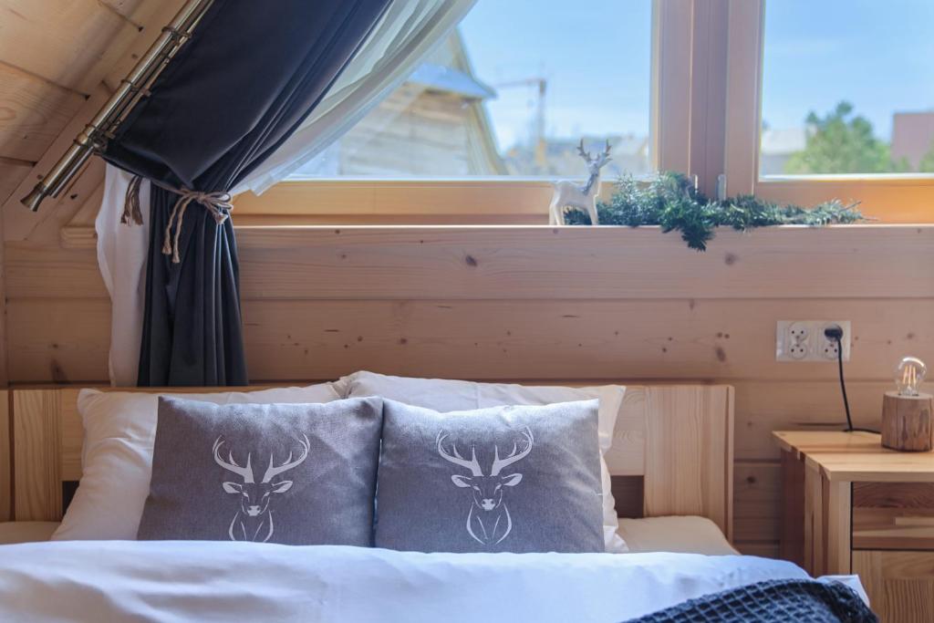 Posteľ alebo postele v izbe v ubytovaní Domek Góralski Premium - Highlander Chalet Kościelisko-Zakopane