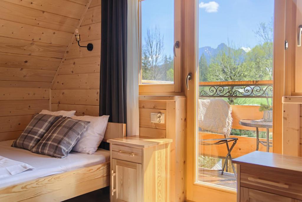 Posteľ alebo postele v izbe v ubytovaní Domek Góralski Premium - Highlander Chalet Kościelisko-Zakopane