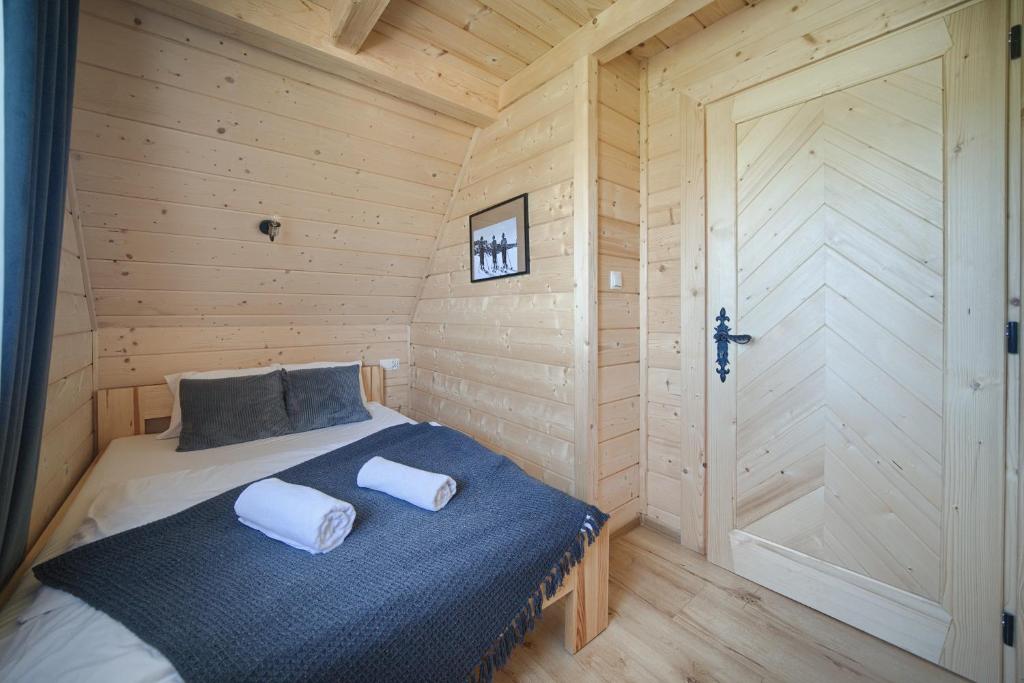 Posteľ alebo postele v izbe v ubytovaní Domek Góralski Premium - Highlander Chalet Kościelisko-Zakopane