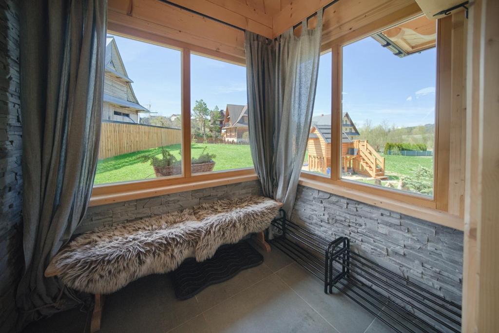 Balkón alebo terasa v ubytovaní Domek Góralski Premium - Highlander Chalet Kościelisko-Zakopane