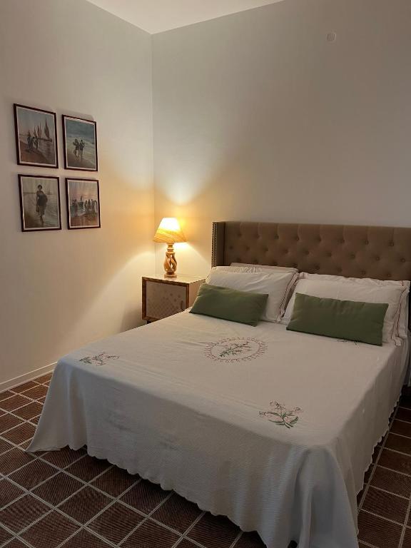 Postel nebo postele na pokoji v ubytování B&B I versi del mare