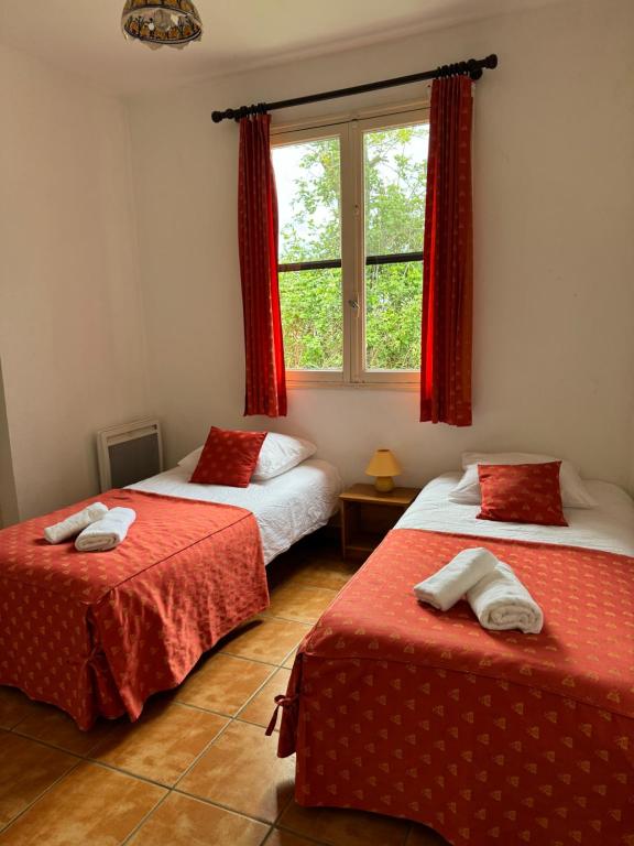 Una cama o camas en una habitaci&oacute;n de Manade BEC