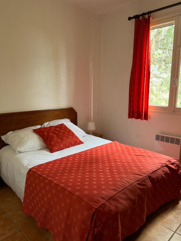 Una cama o camas en una habitaci&oacute;n de Manade BEC