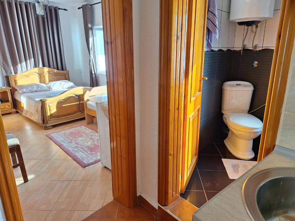 Postel nebo postele na pokoji v ubytování Guest house Naser