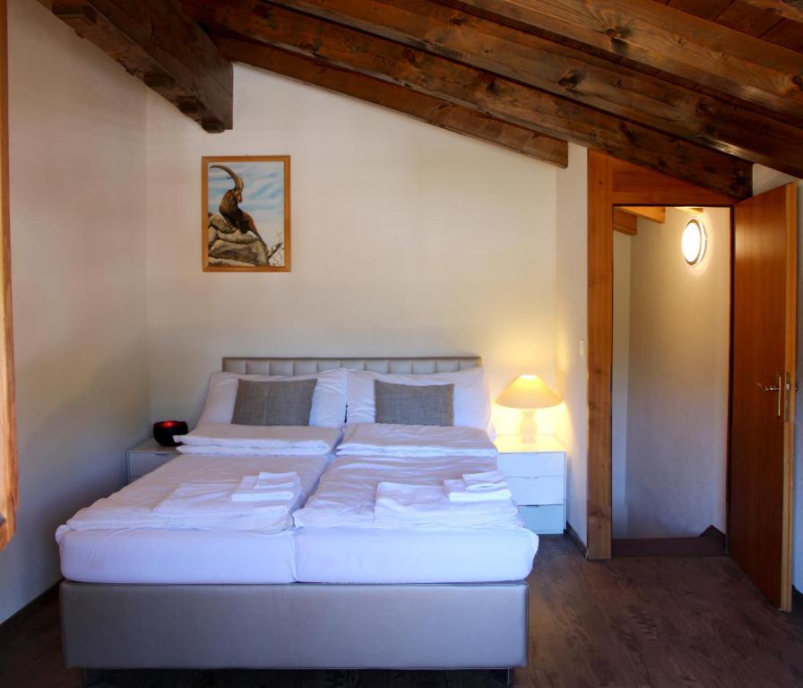 Posteľ alebo postele v izbe v ubytovaní Aparthotel Ambassador