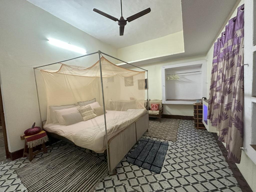 מיטה או מיטות בחדר ב-Stay At The Home