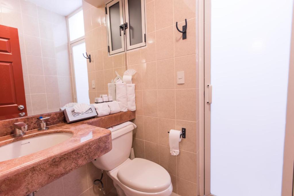 Koupelna v ubytování Hotel Santa Regina
