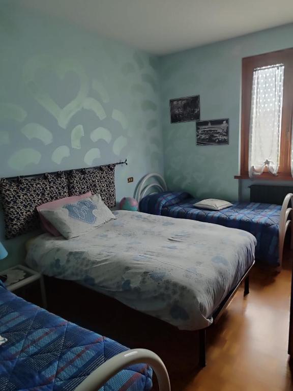 Postel nebo postele na pokoji v ubytování B&B La Dea