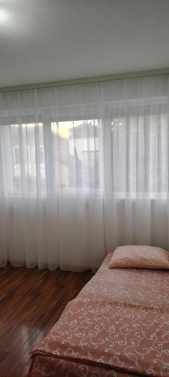 Postel nebo postele na pokoji v ubytování Župski TRG