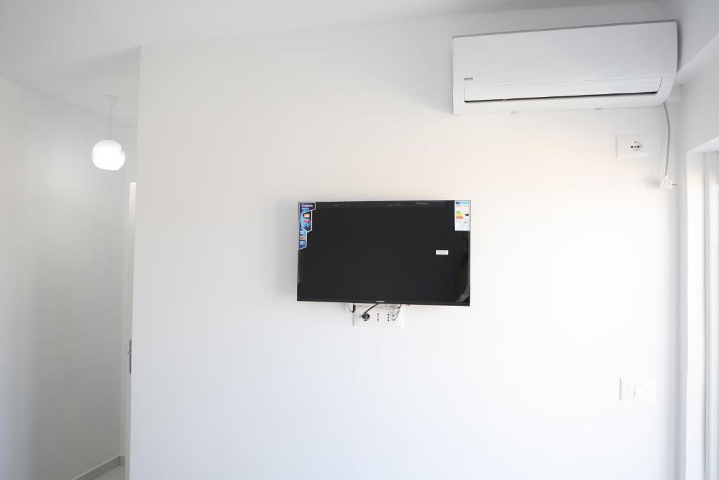 TV a/nebo společenská místnost v ubytování Ida Apartments