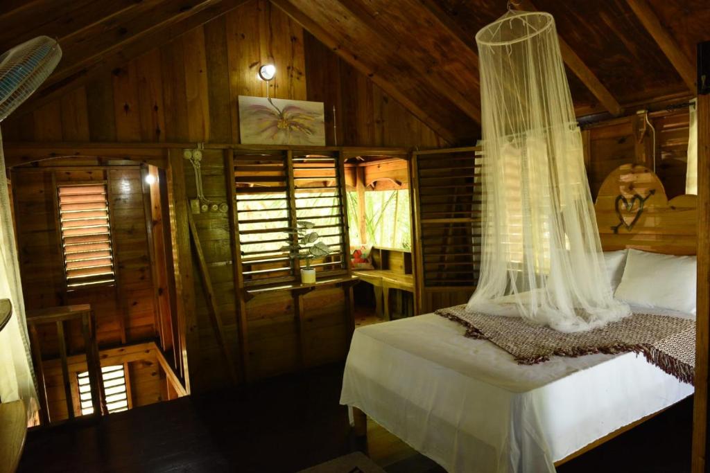 Postel nebo postele na pokoji v ubytování Somali Jungle Eco Lodge and Cabins