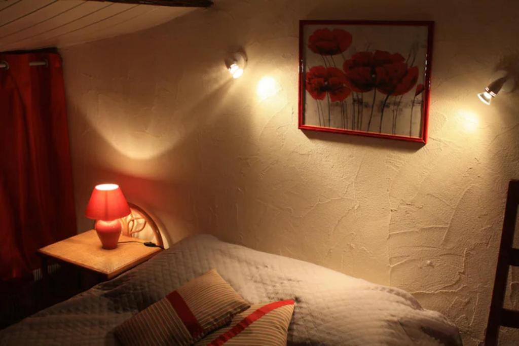 Cama o camas de una habitaci&oacute;n en G&icirc;te Le Laurentin