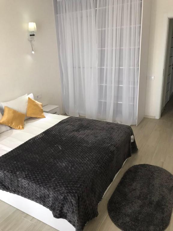 Light Apartments - One-Bedroom Apartment With Balcony And City View