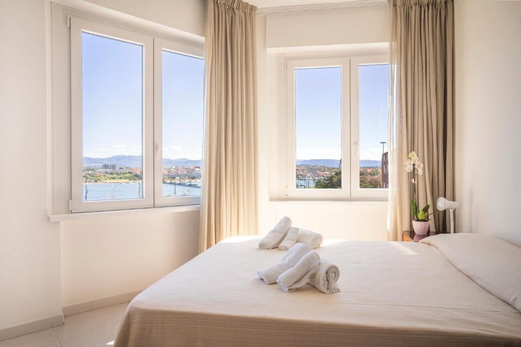 Posteľ alebo postele v izbe v ubytovaní Hotel De Plam