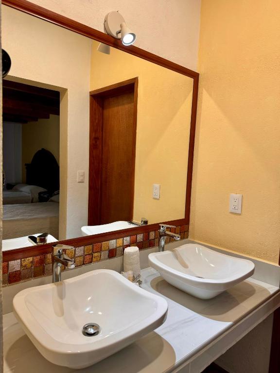 Koupelna v ubytování Hotel Hacienda Real