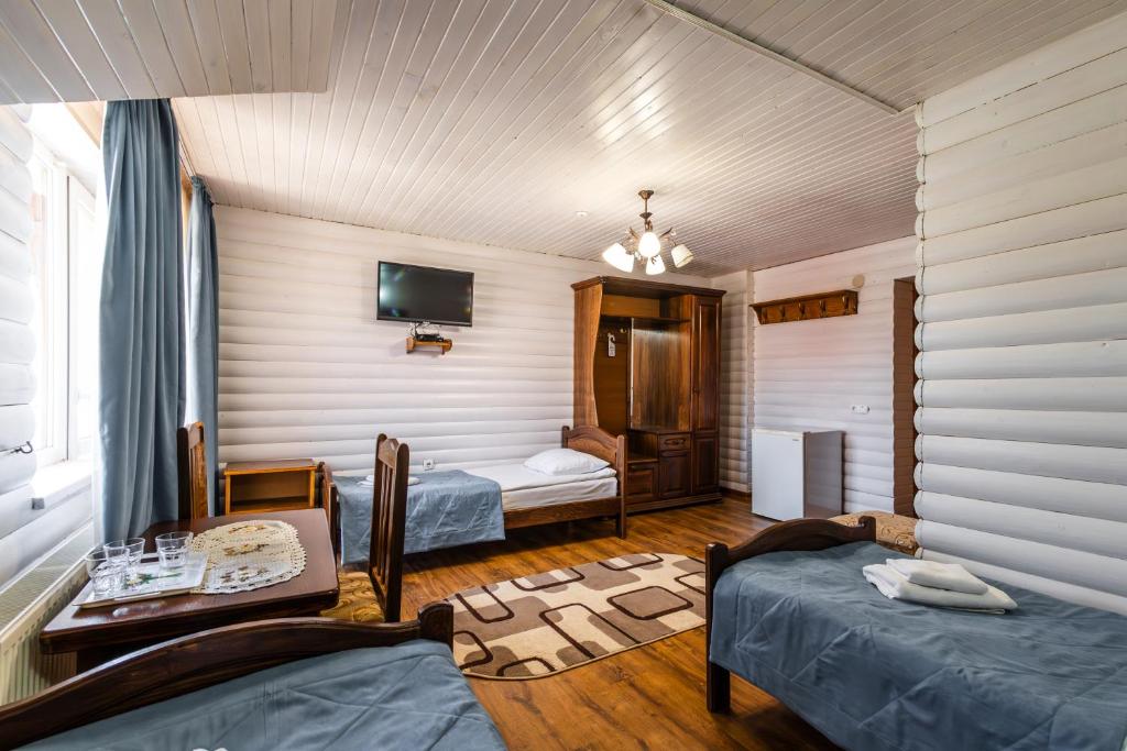 Postel nebo postele na pokoji v ubytování Villa Anet
