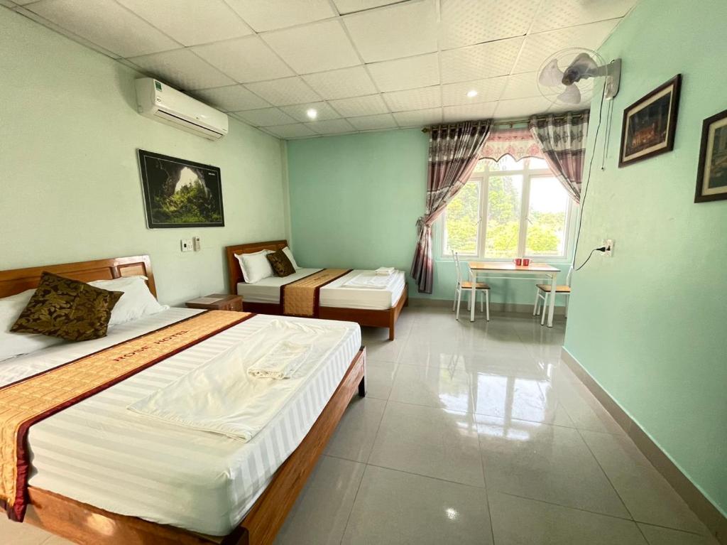 Postel nebo postele na pokoji v ubytování Bee Backpackers Hostel