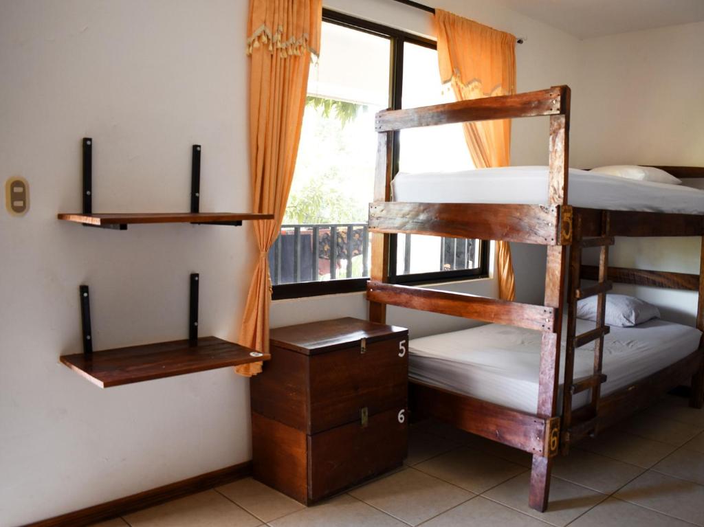 Postel nebo postele na pokoji v ubytování La Posada - Hostel