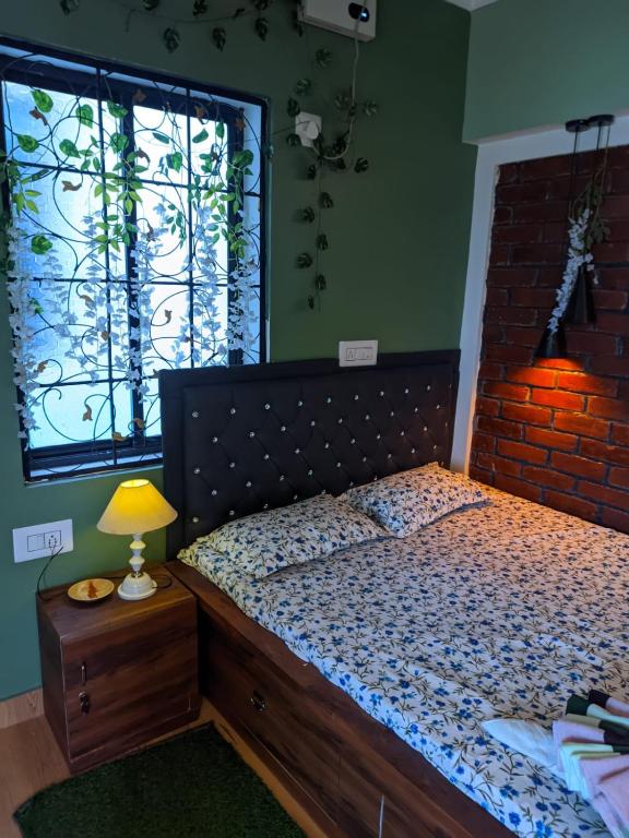 Postel nebo postele na pokoji v ubytování Pravuprasad Homestay
