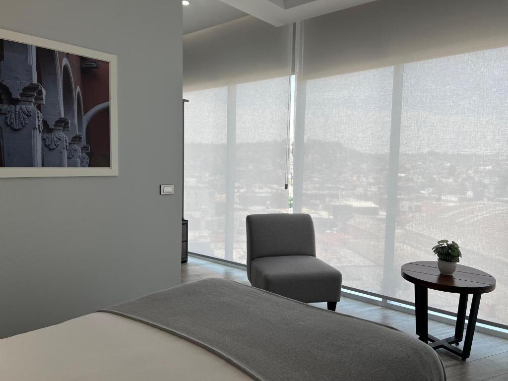 Postel nebo postele na pokoji v ubytování Hotel GRALTA