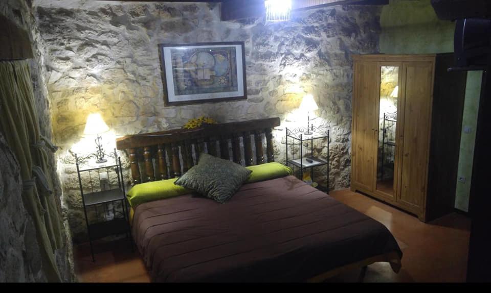Postel nebo postele na pokoji v ubytování Posada del Dulce Sueño