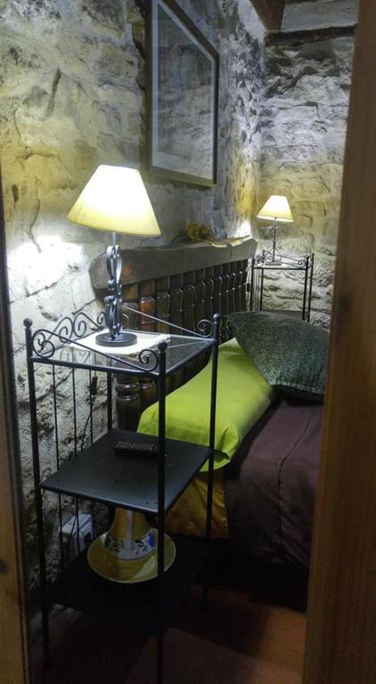 Postel nebo postele na pokoji v ubytování Posada del Dulce Sueño