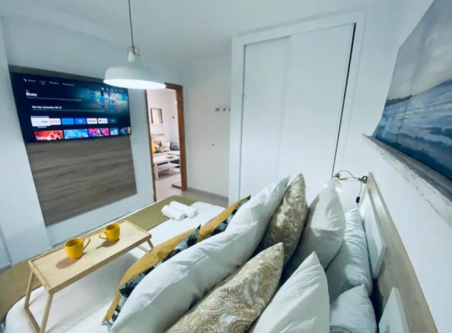 TV a/nebo společenská místnost v ubytování Apartamento céntrico