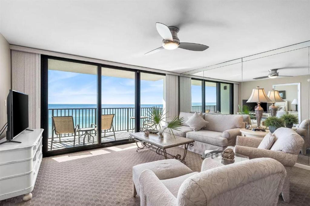 a living room with a view of the ocean at One Seagrove Place 0506 in Seagrove Beach