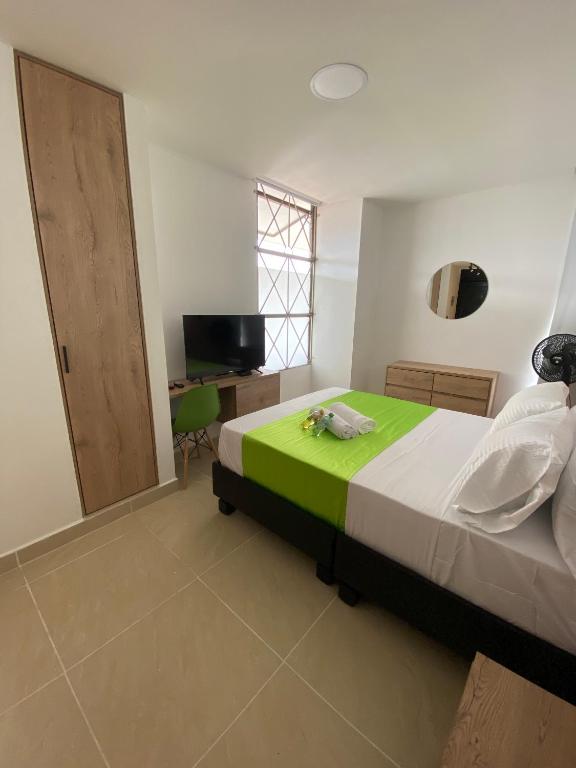Letto o letti in una camera di Caliview Apartahotel Andalaya