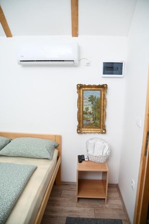 Postel nebo postele na pokoji v ubytování Konak Dobri Potok