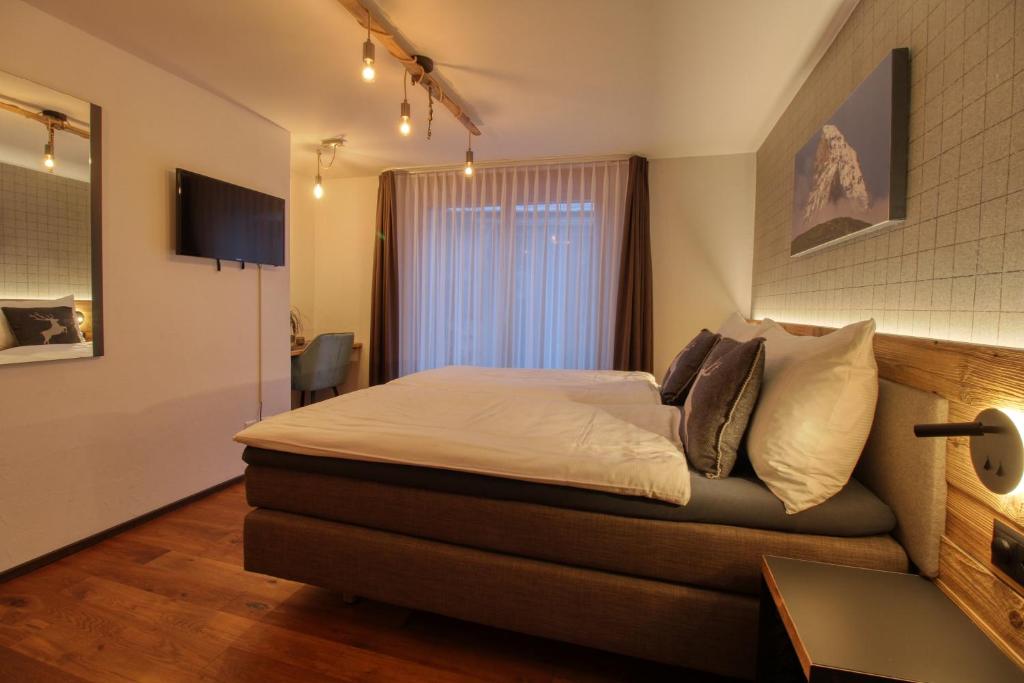 Chalet A la Casa TV 또는 엔터테인먼트 센터