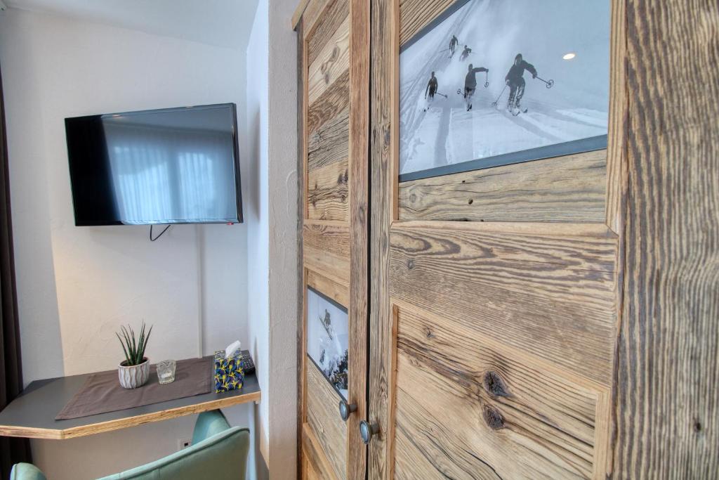 Chalet A la Casa TV 또는 엔터테인먼트 센터