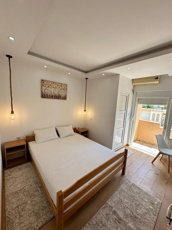 Postel nebo postele na pokoji v ubytování Ceka Apartments