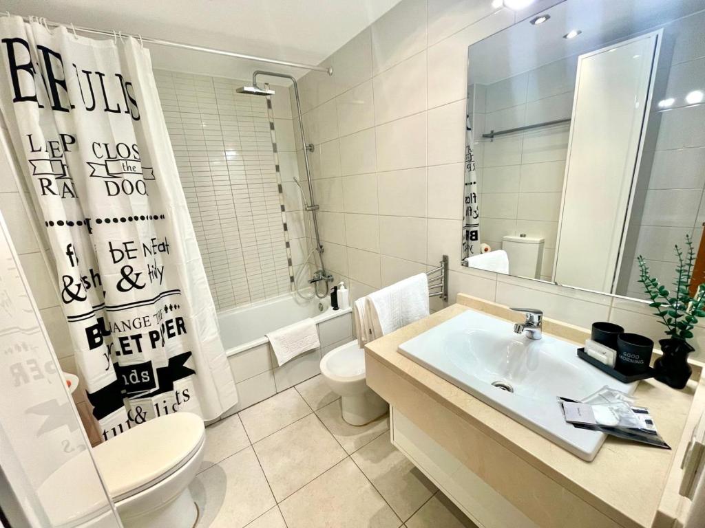Koupelna v ubytování Tenerifeopenhome Townhouse Oasis Fañabe 21