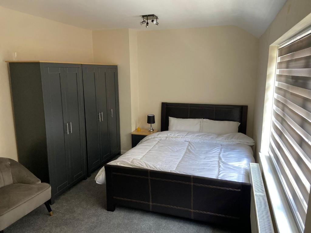 Postel nebo postele na pokoji v ubytování Peeams abode