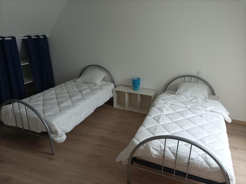Postel nebo postele na pokoji v ubytování Gîte de saint pabut
