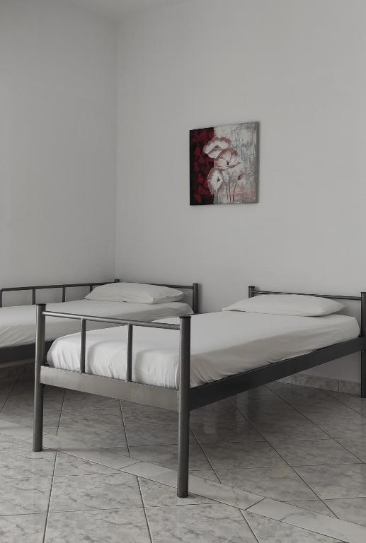 Postel nebo postele na pokoji v ubytování Sunset Studios