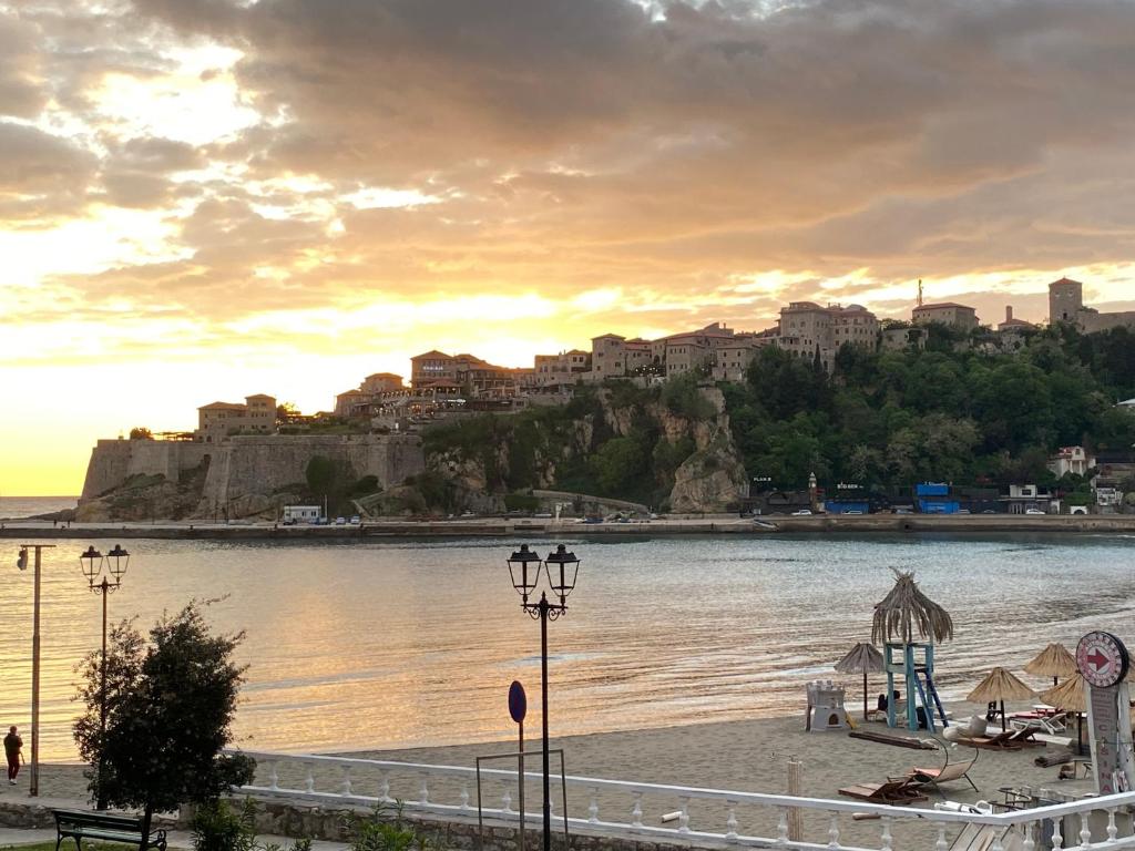 a view of a body of water with a city at Seafront Apartments in Ulcinj