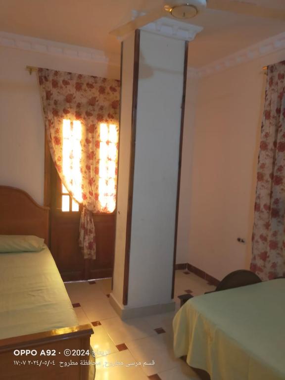 Postel nebo postele na pokoji v ubytování Marsa Matruh Chalet#2