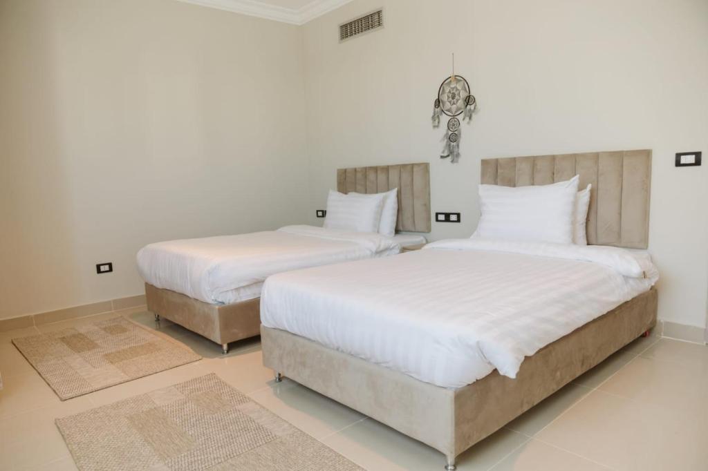 Postel nebo postele na pokoji v ubytování TK Royal & Spa