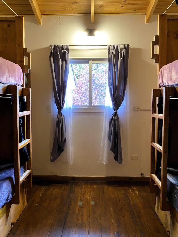 Postel nebo postele na pokoji v ubytování Hostel Cosmo