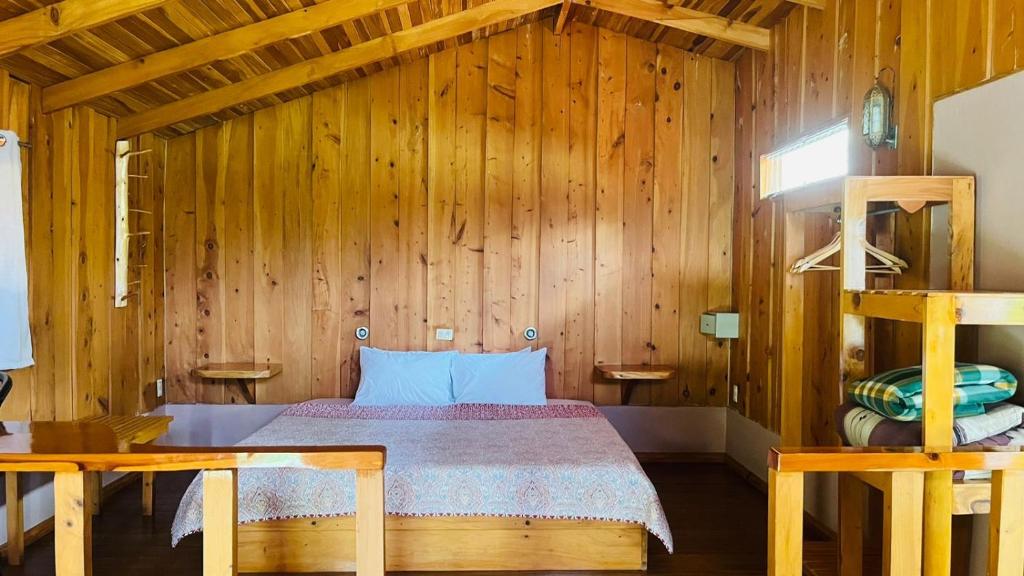 Postel nebo postele na pokoji v ubytování El Toucanet Lodge & Restaurante