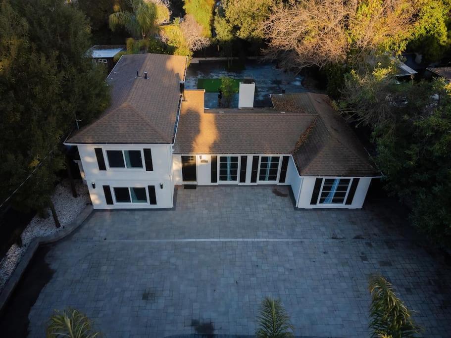 an aerial view of a house with a driveway at Villa Palo Alto in East Palo Alto