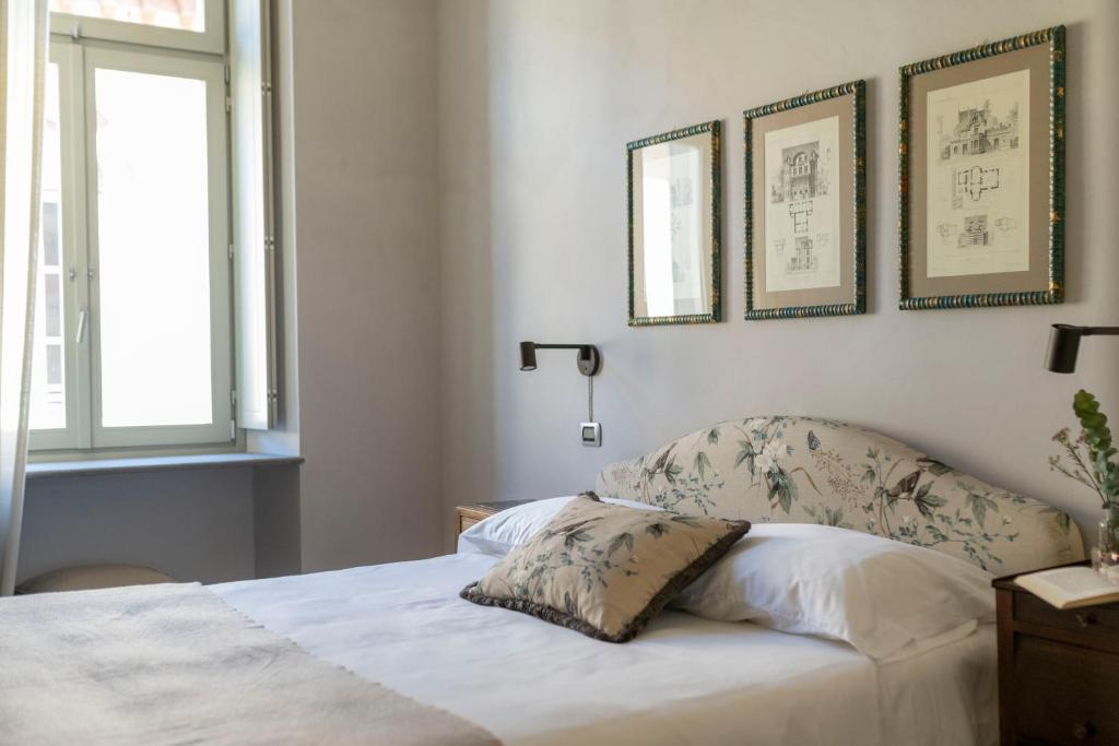 Postel nebo postele na pokoji v ubytování ALMA bed & breakfast
