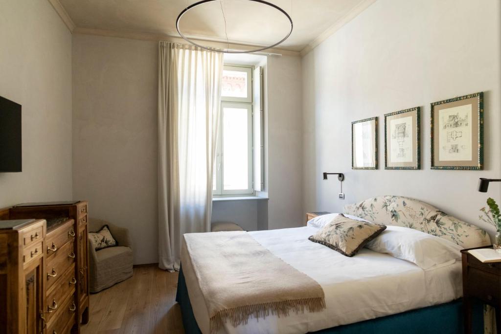 Postel nebo postele na pokoji v ubytování ALMA bed & breakfast