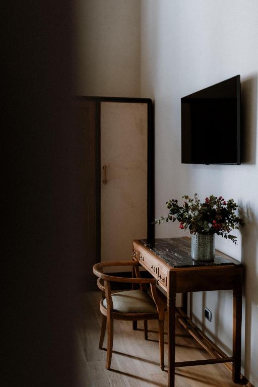 TV a/nebo společenská místnost v ubytování ALMA bed & breakfast