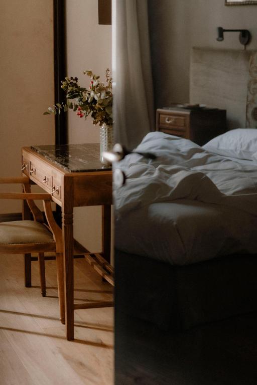 Postel nebo postele na pokoji v ubytování ALMA bed & breakfast